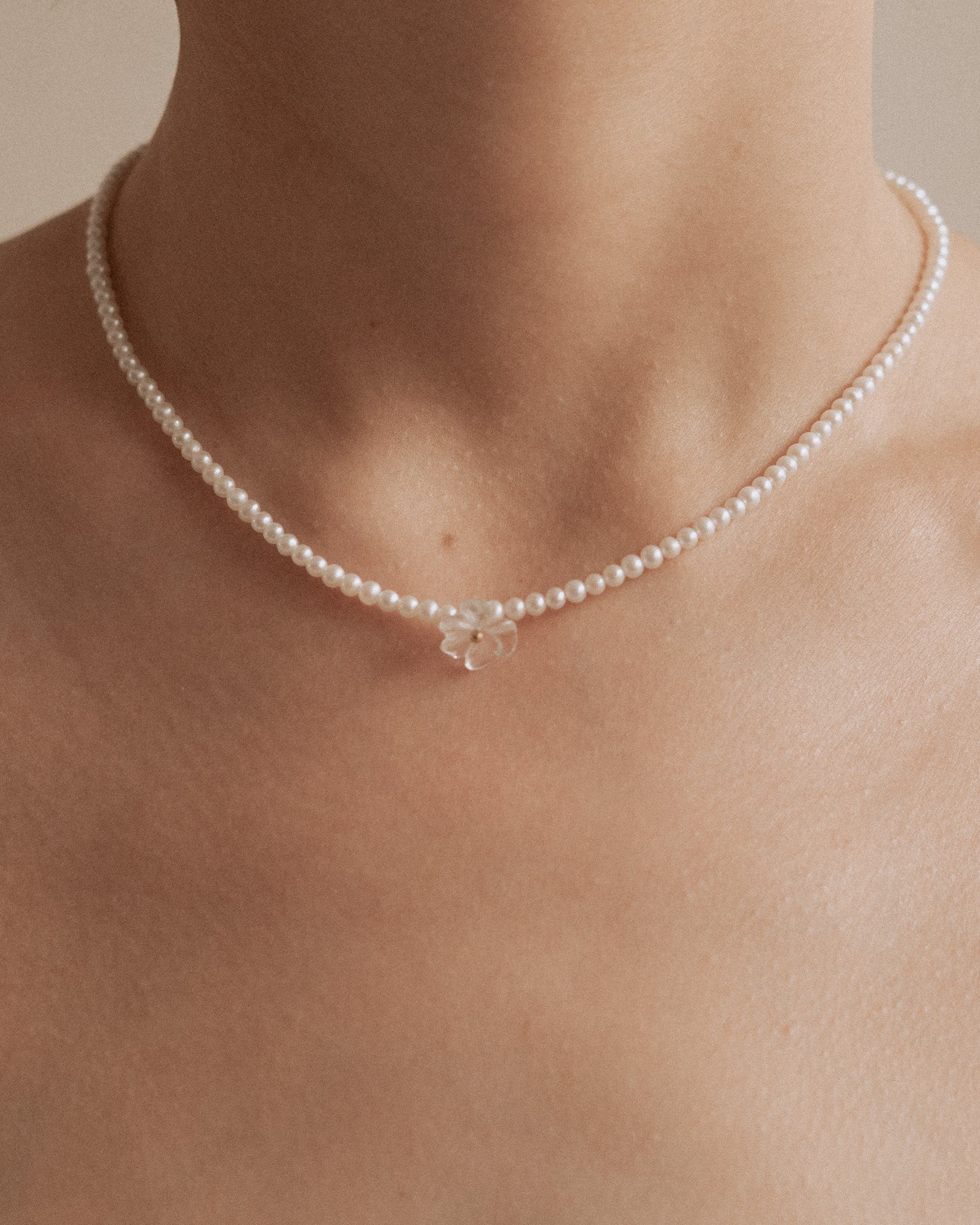 ______ 's Mneme Pearl Necklace