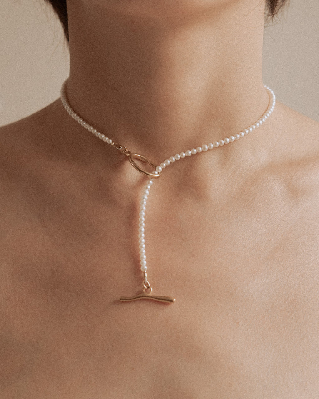 ______ 's Mneme Pearl Necklace