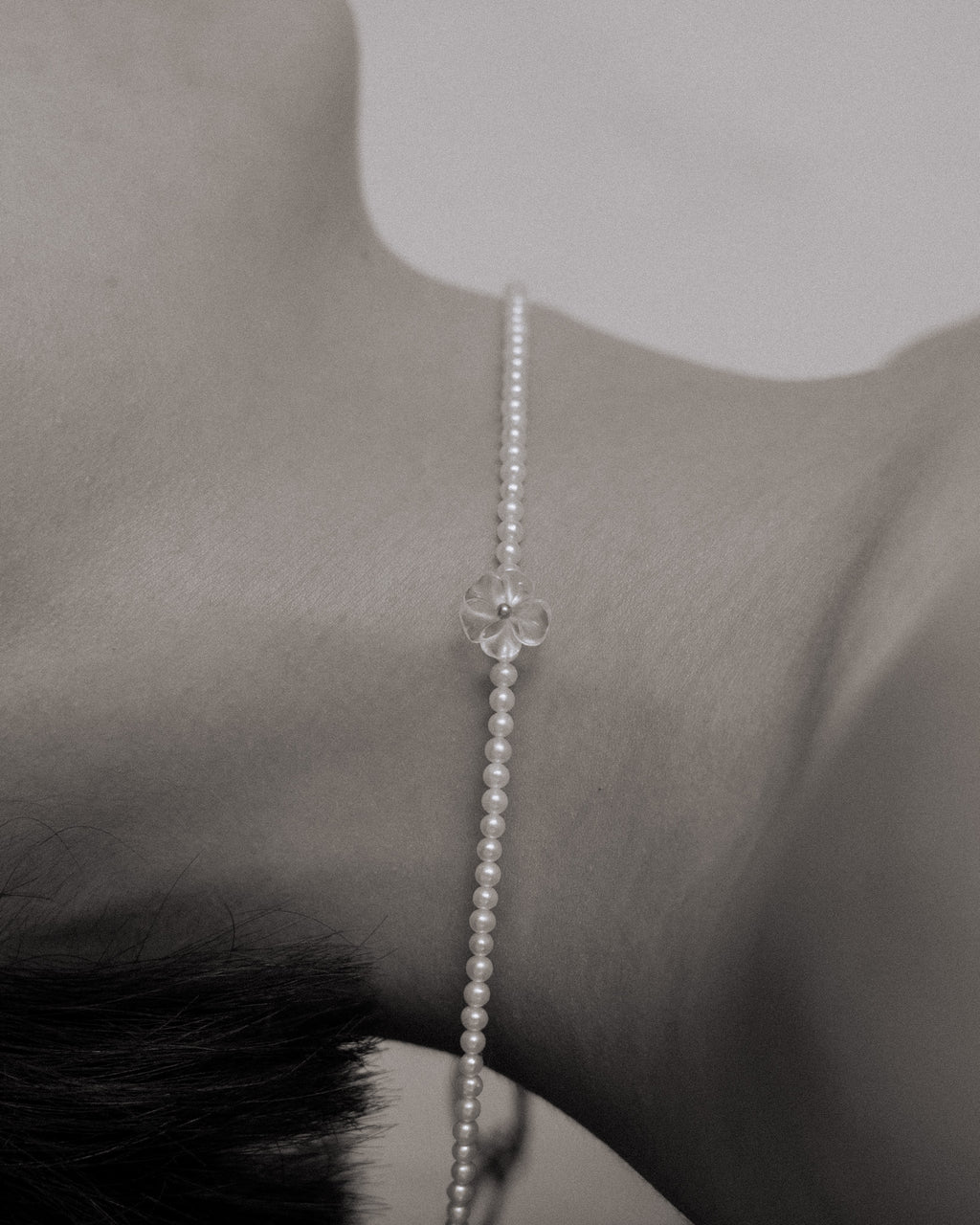 ______ 's Mneme Pearl Necklace